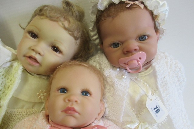 Four Ashton Drake dolls Image