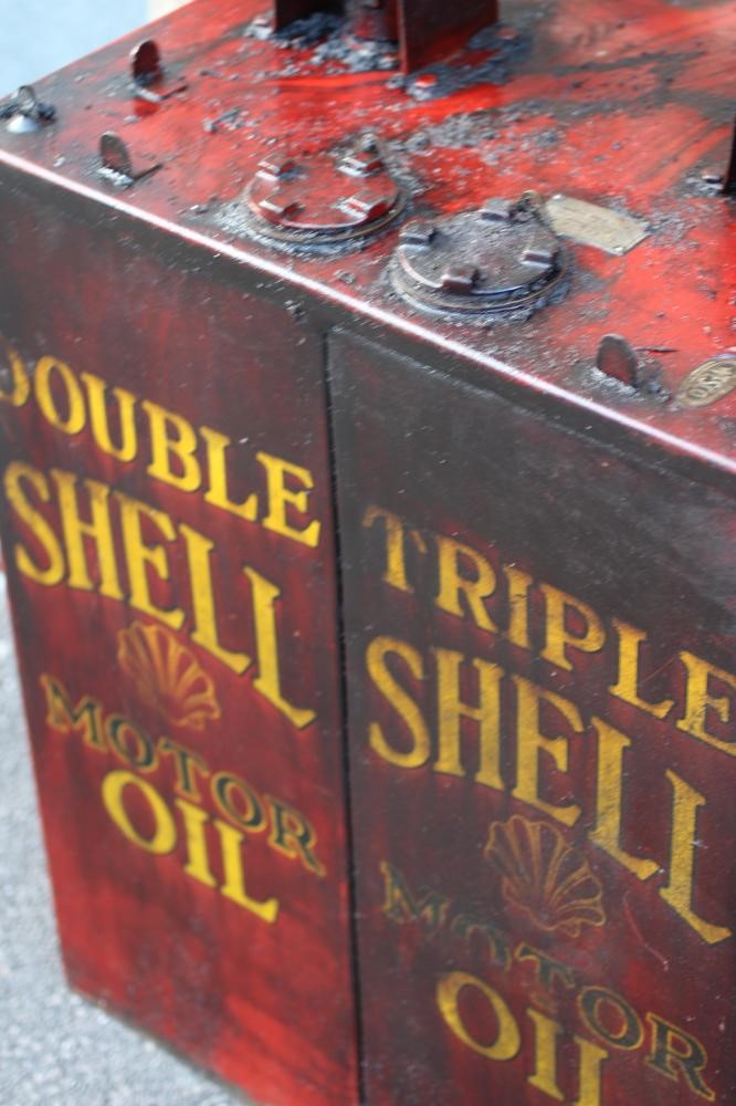 A floor standing garage oil dispenser pump finished in red with two pumps Image