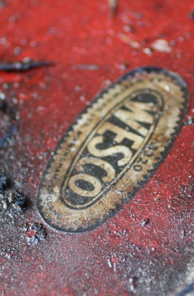 A floor standing garage oil dispenser pump finished in red with two pumps Image