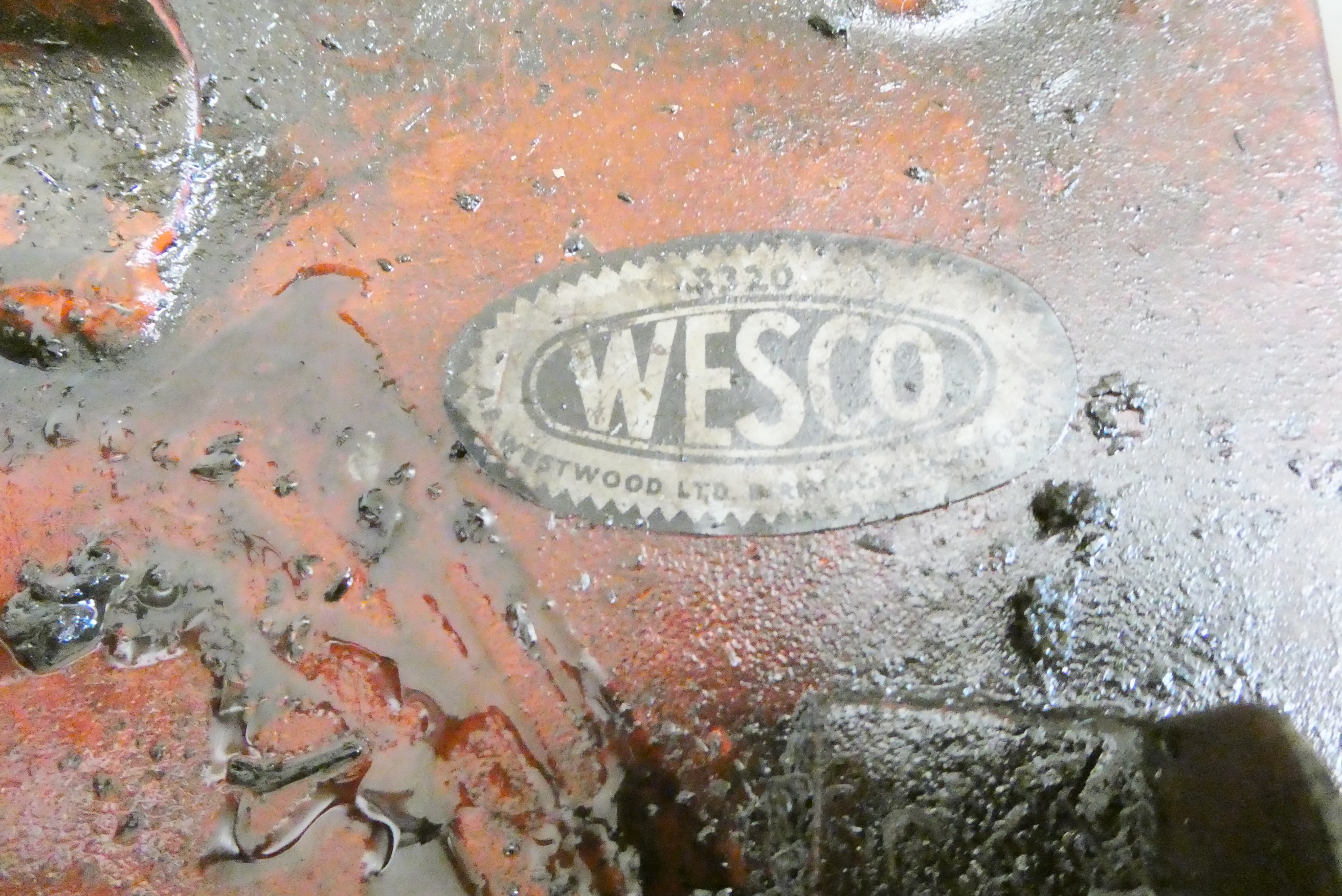 A floor standing garage oil dispenser pump finished in red with two pumps Image