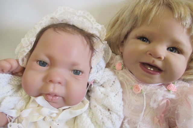 Four Ashton Drake dolls Image