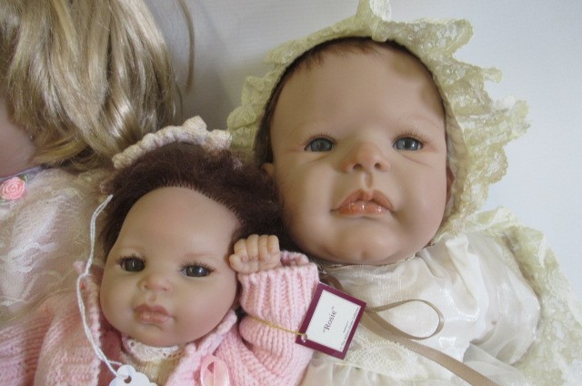 Four Ashton Drake dolls Image