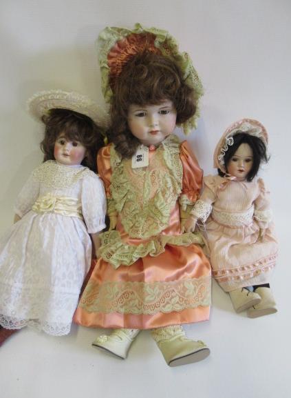 Three reproduction dolls Image