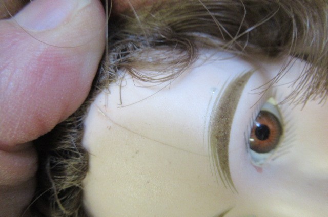 Three reproduction dolls Image