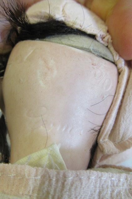 Three reproduction dolls Image