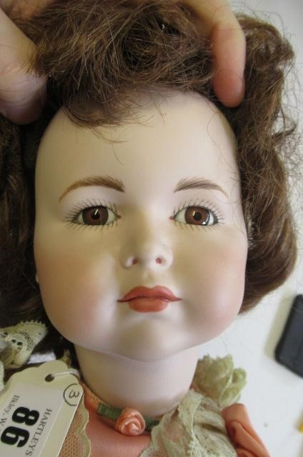 Three reproduction dolls Image