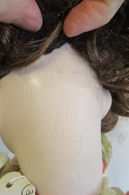 Three reproduction dolls Image