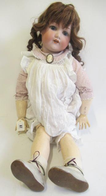 An Armand Marseille bisque socket head doll Image