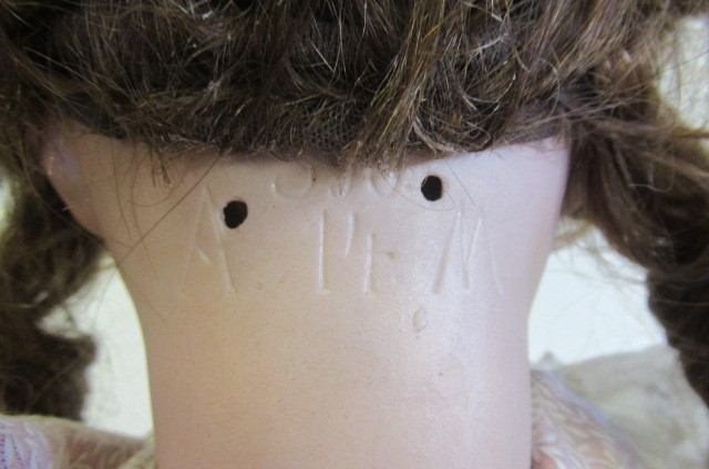 An Armand Marseille bisque socket head doll Image