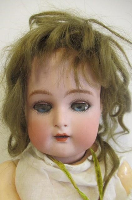 A Kammer & Reinhardt bisque socket head doll Image