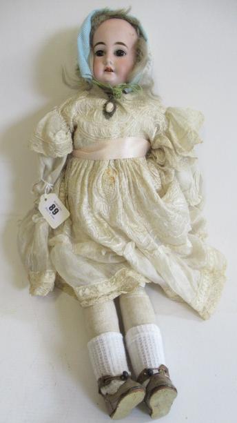 A Cuno & Otto Dressel bisque shoulder head doll Image