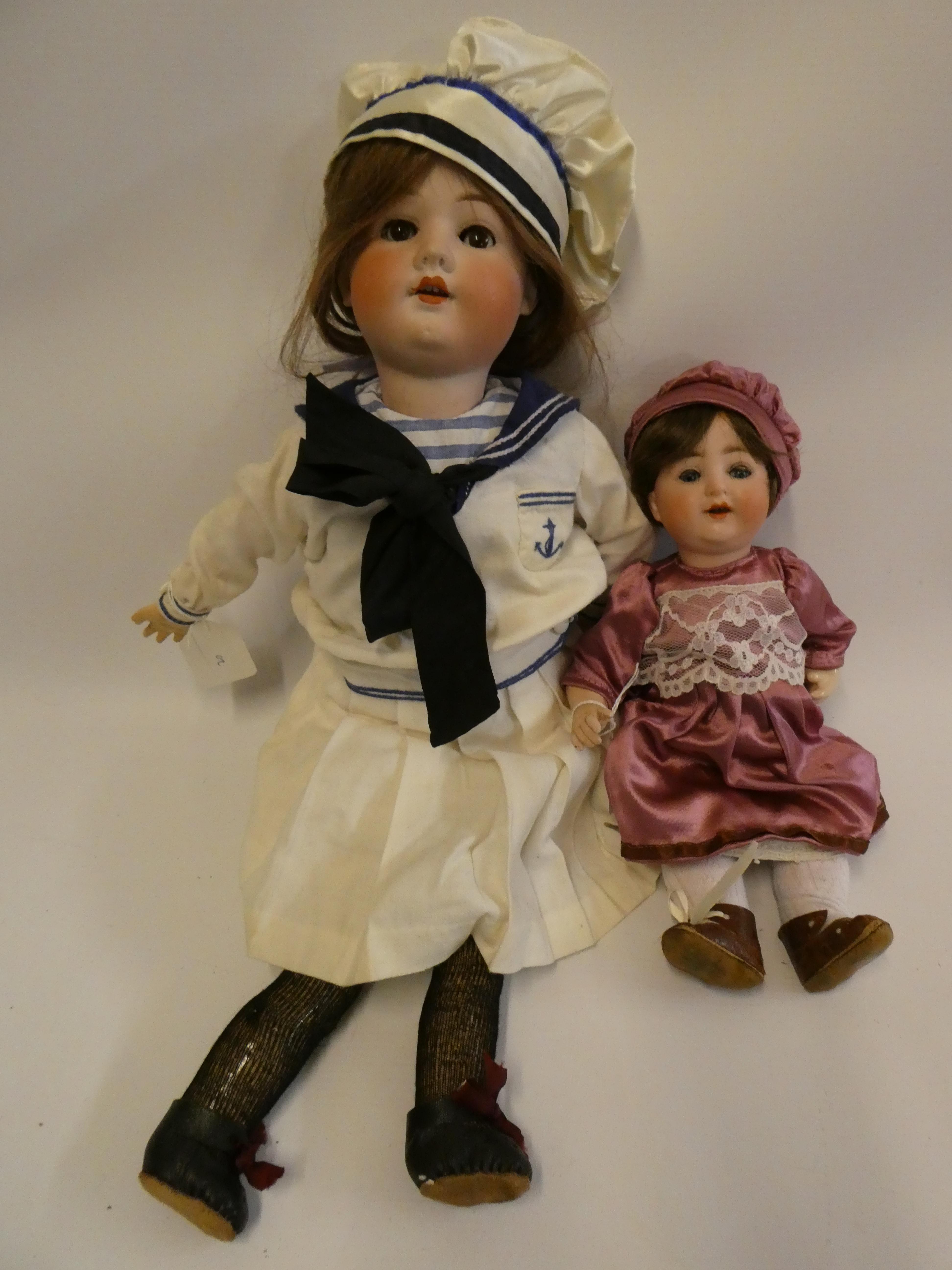 Two bisque socket head dolls Image