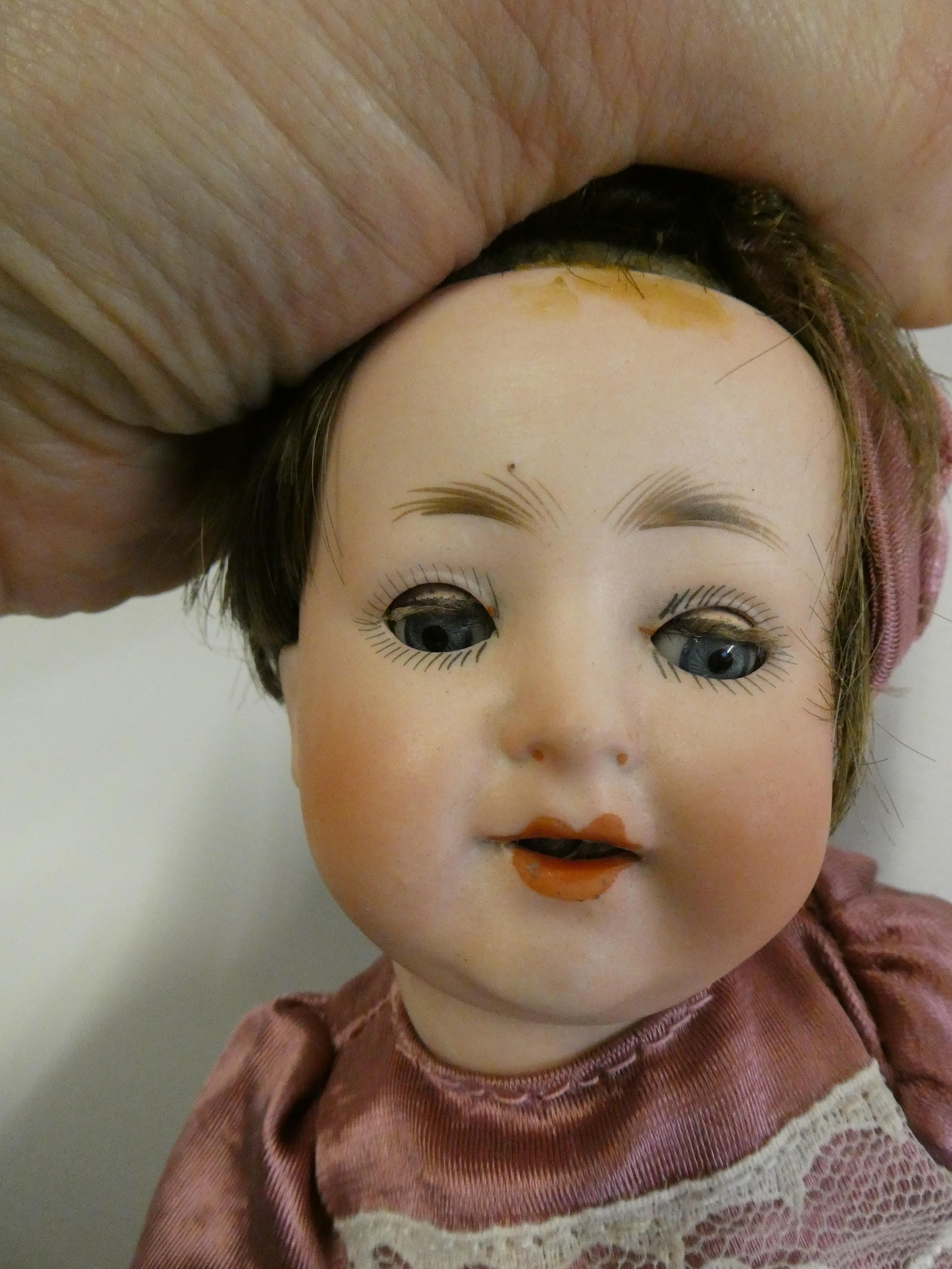 Two bisque socket head dolls Image