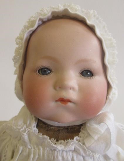 Three bisque head dolls Image
