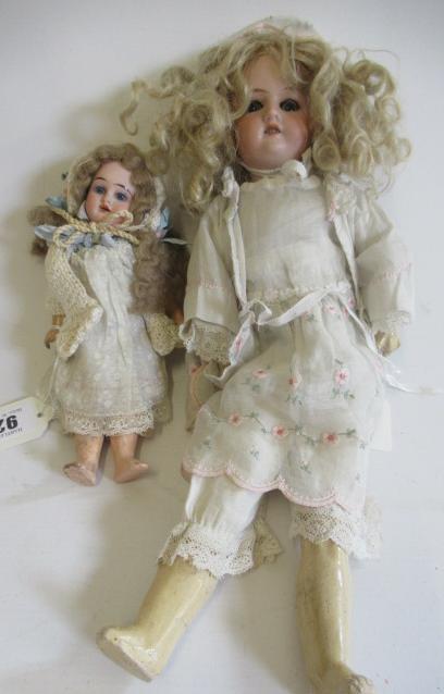 Two Armand Marseille bisque socket head dolls Image