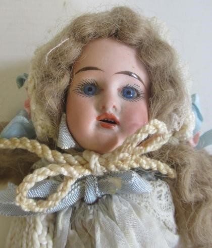 Two Armand Marseille bisque socket head dolls Image