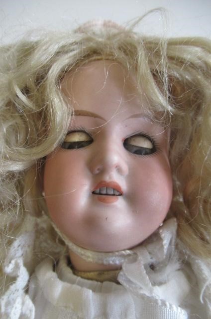 Two Armand Marseille bisque socket head dolls Image