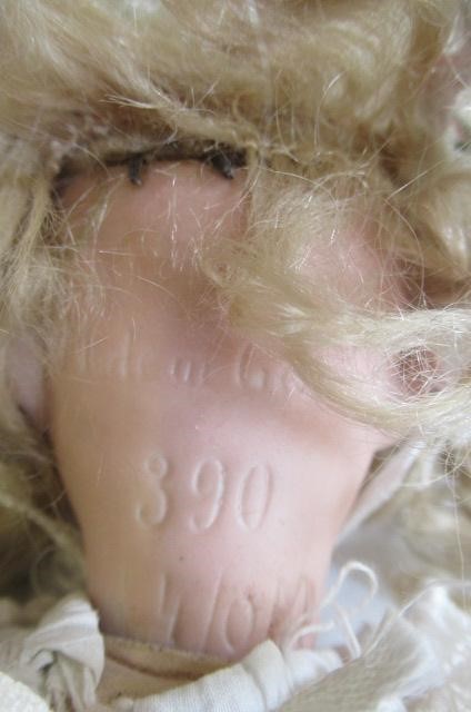 Two Armand Marseille bisque socket head dolls Image