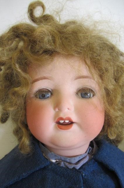 Two Armand Marseille bisque socket head character dolls Image