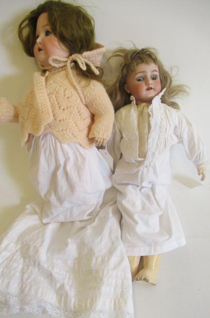 Two bisque socket head dolls Image