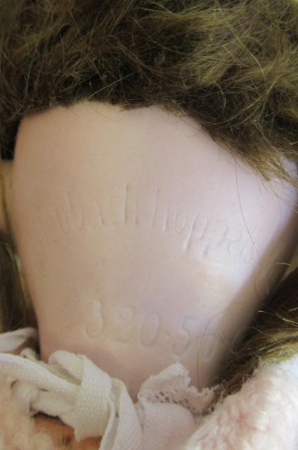 Two bisque socket head dolls Image