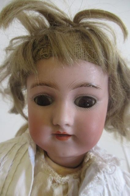 Two bisque socket head dolls Image