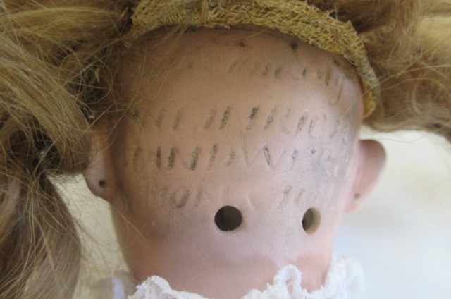 Two bisque socket head dolls Image