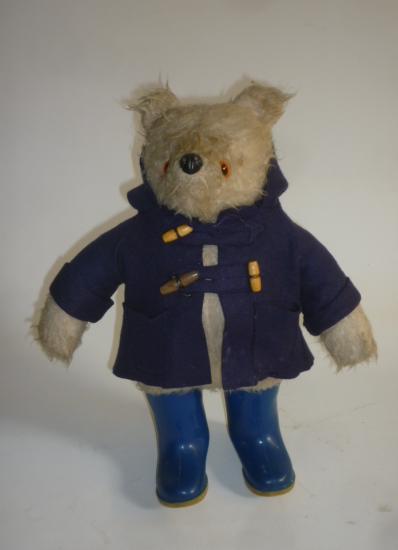 A Paddington Bear with navy blue felt duffel and blue wellington boots (no label) Image