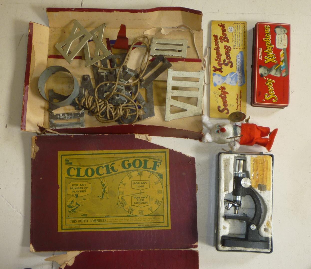 An early 20th century Clock Golf Set with cast metal Roman tee numbers 1-XII Image