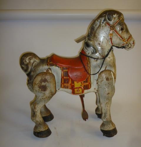 A Mobo tinplate walking horse with pedal action Image