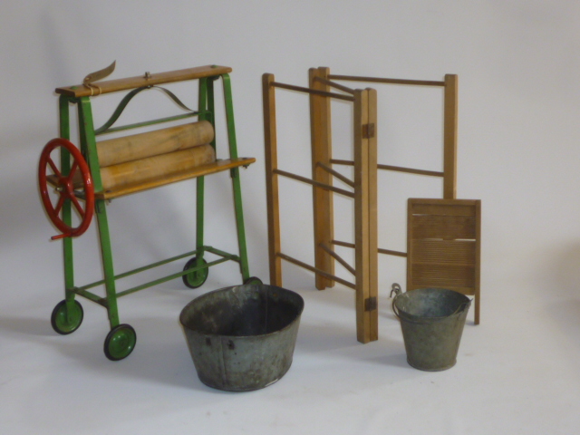 A toy washing day set comprising Triang mangle in wood and metal with printed trademark and rubber Image
