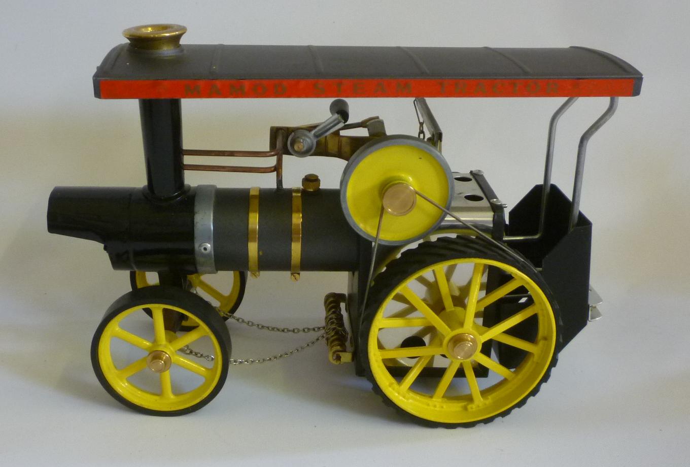 A Mamod Traction Engine with engineered modifications including boiler front and steering Image