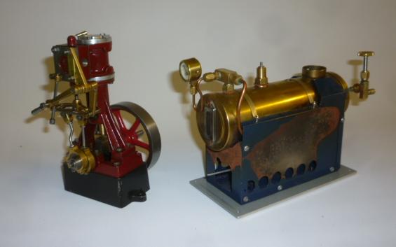 A vertical steam engine with single cylinder gearing and fly wheel Image