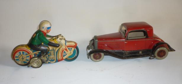 A Chad Valley tinplate town car in red and black Image