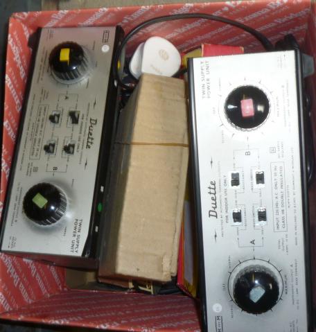 Two H & M Duette 12v train controllers and a quantity of playworn locomotives Image