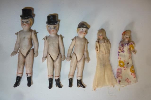 Five all bisque dolls' house dolls Image