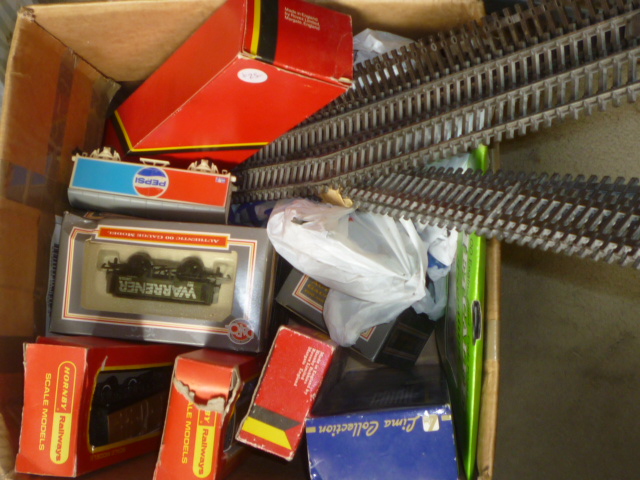 Hornby B12 4-6-0 locomotive in black with three L.N.E.R. coaches Image