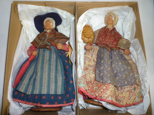 A pair of Jouglas clay dolls Image