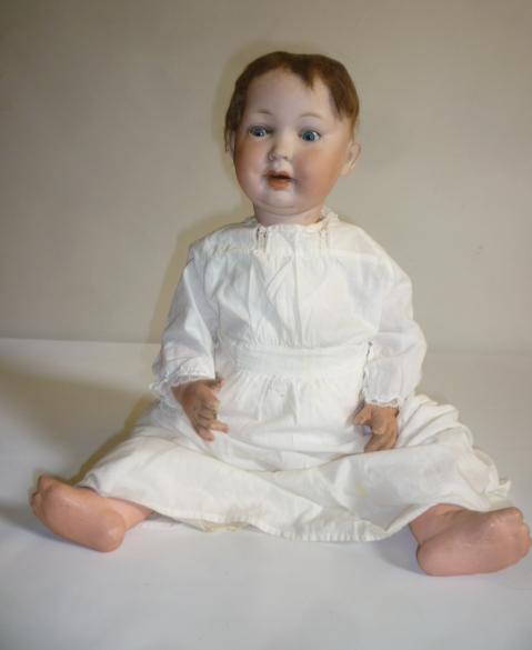 A Porzellanfabrik Mengersgereuth bisque head doll with blue glass sleeping eyes Image