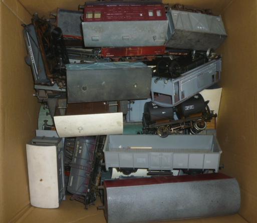 Approximately eighty playworn Gauge O wagons by Slaters Image