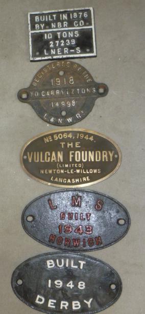 Four various cast iron wagon plates comprising "LMS BUILT 1943 HORWICK" oval Image
