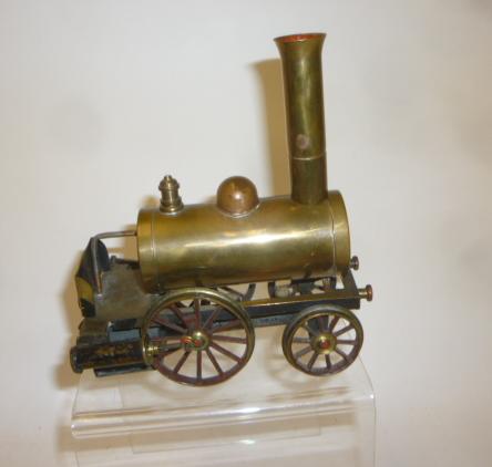 A small 2 1/2" gauge spirit fired Dribbler locomotive Image