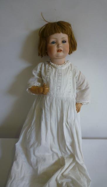 A Bahr & Proschild bisque head character doll with blue glass sleeping eyes Image