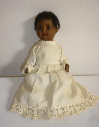 A Schoenau & Hofmeister "Hanna" bisque head Mulatto doll with brown glass sleeping eyes Image