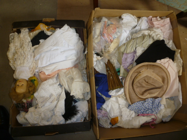 A large quantity of dolls' clothing Image