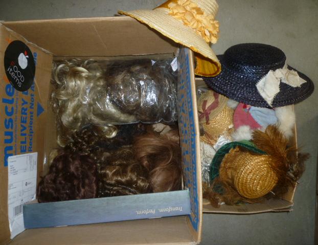 A quantity of dolls' straw hats Image