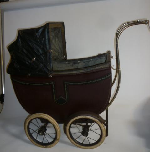 A dolls' pram Image