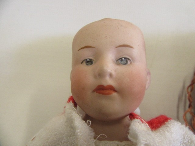 A Heubach bisque shoulder head 'solemn' doll Image