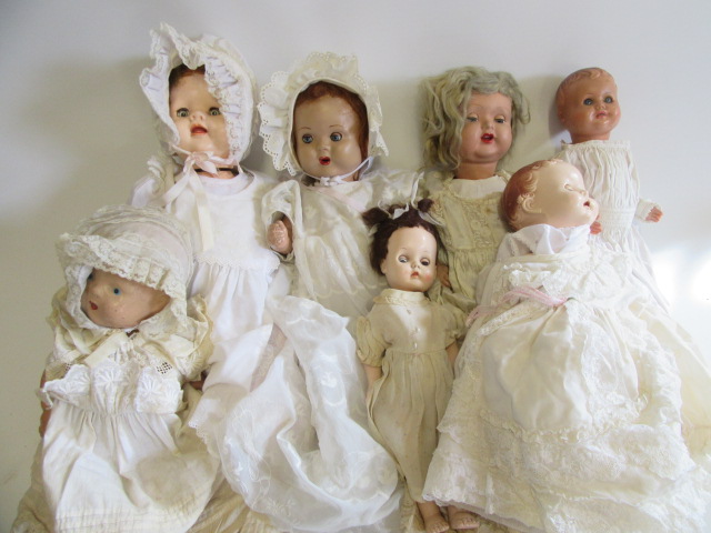 Seven celluloid and composition head dolls including Pedigree Image