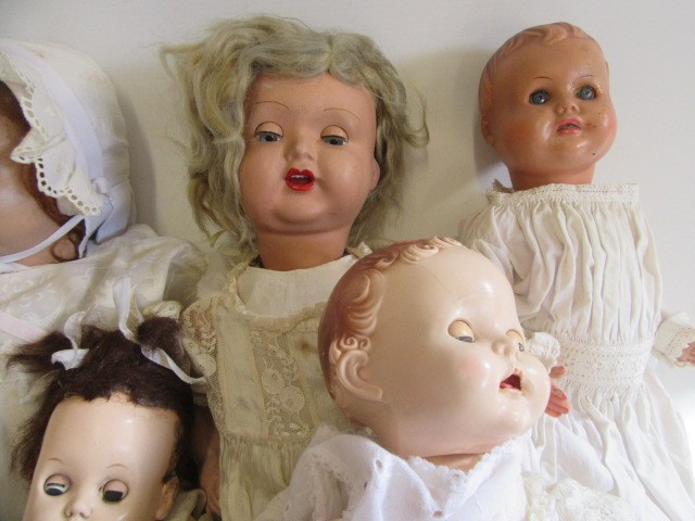 Seven celluloid and composition head dolls including Pedigree Image